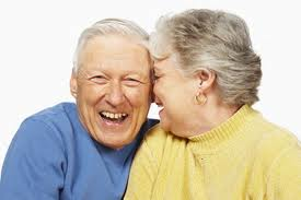 An older couple smiling