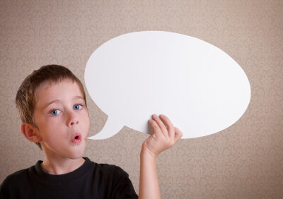 Child with an empty speech bubble