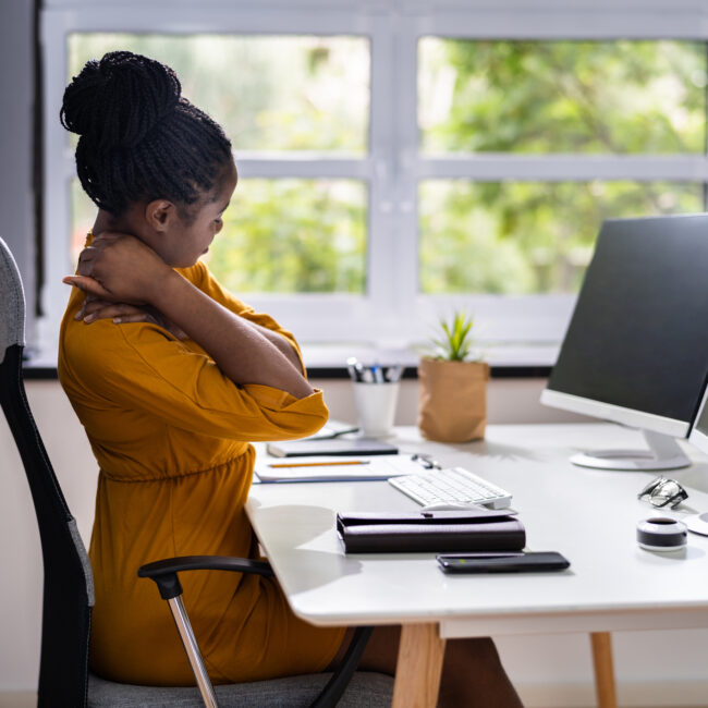 Woman sitting at her desk in an office