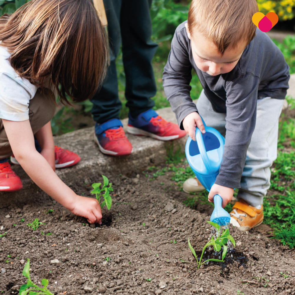 Growing children playing in the garden