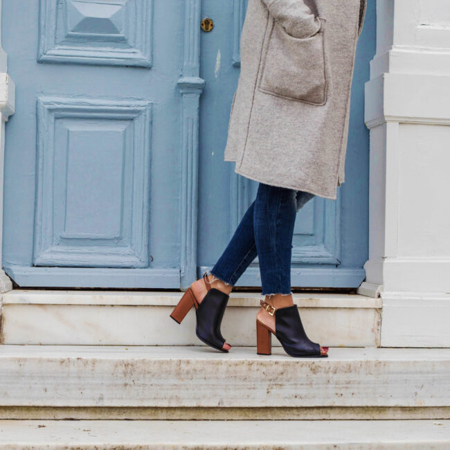 Woman walking in heels outdoors